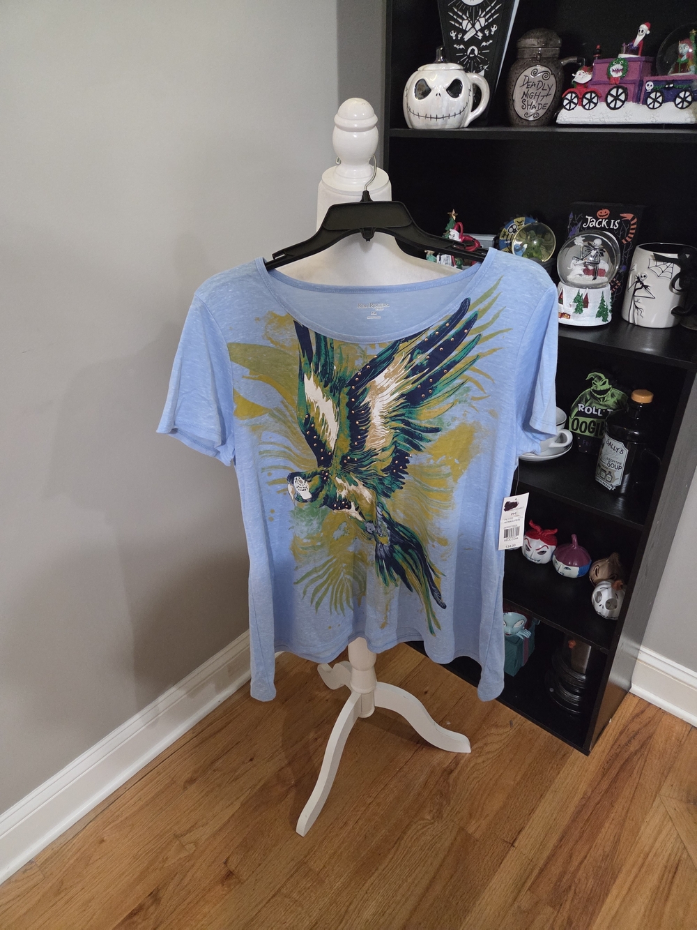 Kim Rogers Light Blue Short Sleeve Tee with Colorful Parrot Graphic